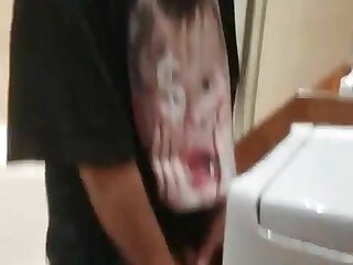 Twink male is pissing in the toilet gay porn tube