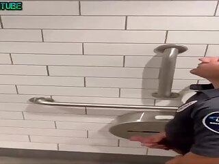 Guard jerking off in the toilet