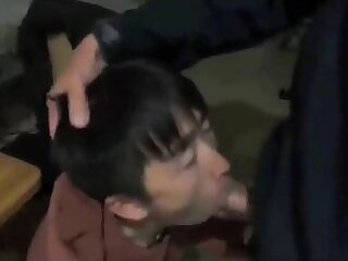 Asian boy on his knees swallowing cum