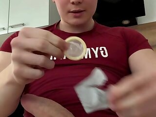 German blond Tim jerking off and cumming in a condom