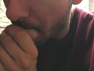 Me sucking cock in a men's room