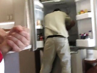 Wank behind fridge repair man