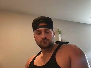 He jerks off his cock and shoots all over his black t-shirt