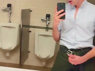 Guy jerks and cums in the restroom