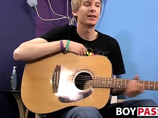 Twink with guitar