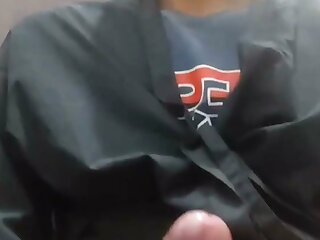 Dude with massive cock explodes jets of cum in a public stall.